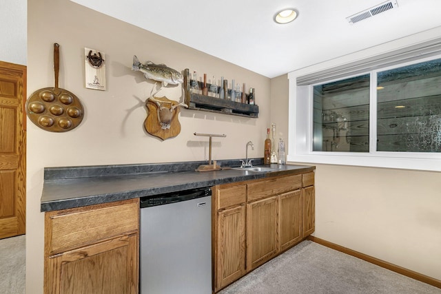 bar featuring sink, stainless steel dishwasher, and light carpet