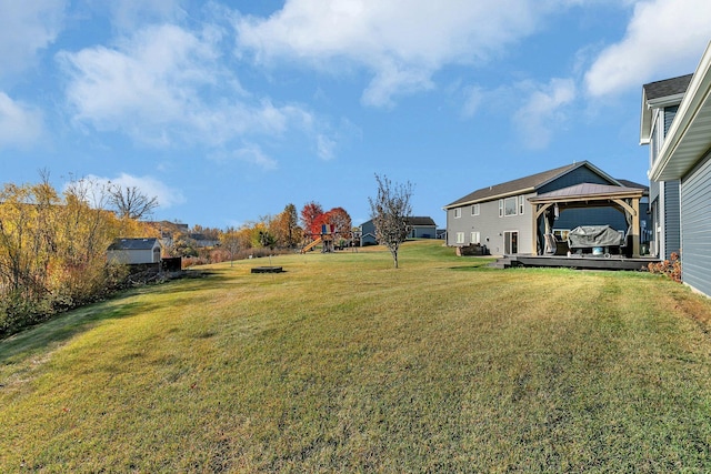 view of yard with a gazebo and a deck