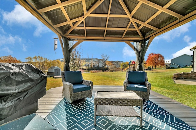 view of patio featuring a gazebo, area for grilling, and a deck