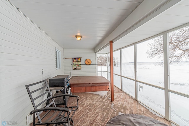 home office featuring hardwood / wood-style floors and wood walls