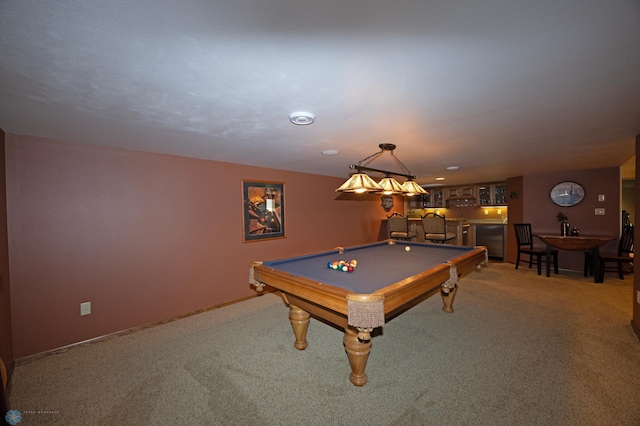 recreation room featuring pool table, carpet, and bar area