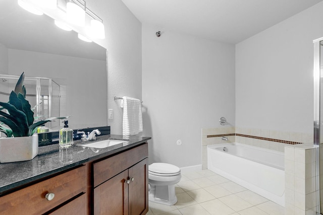 full bathroom with vanity, tile patterned floors, independent shower and bath, and toilet