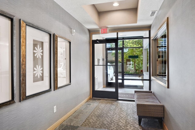 interior space featuring a tray ceiling