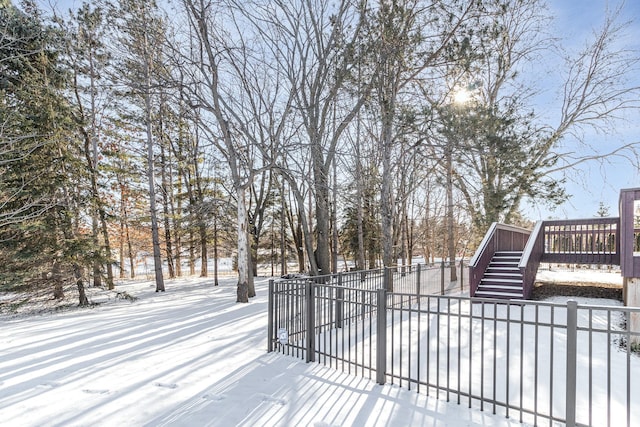 view of snow covered deck