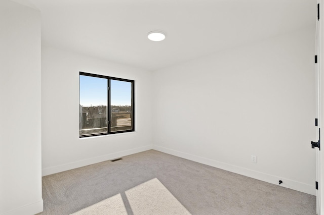 view of carpeted empty room