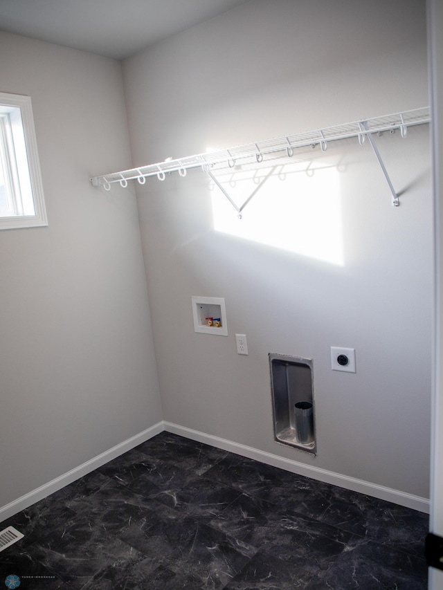 laundry room featuring hookup for a washing machine and electric dryer hookup