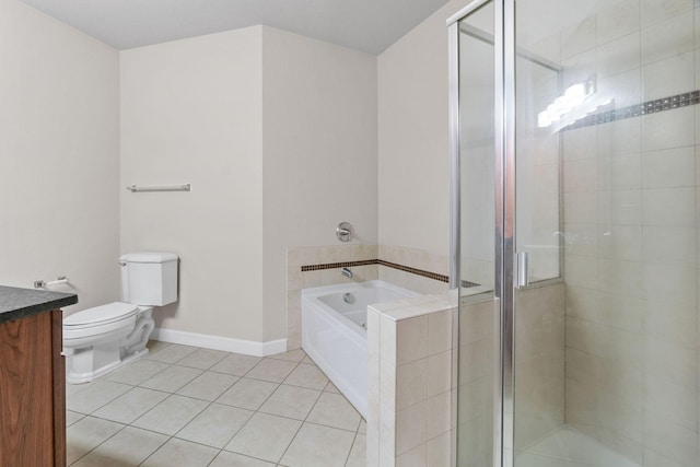 full bathroom with tile patterned flooring, vanity, shower with separate bathtub, and toilet