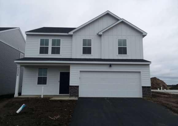 front of property featuring a garage