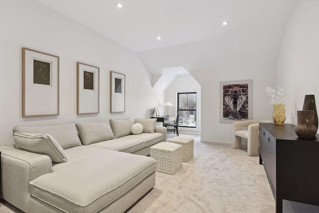 living room with light colored carpet and lofted ceiling