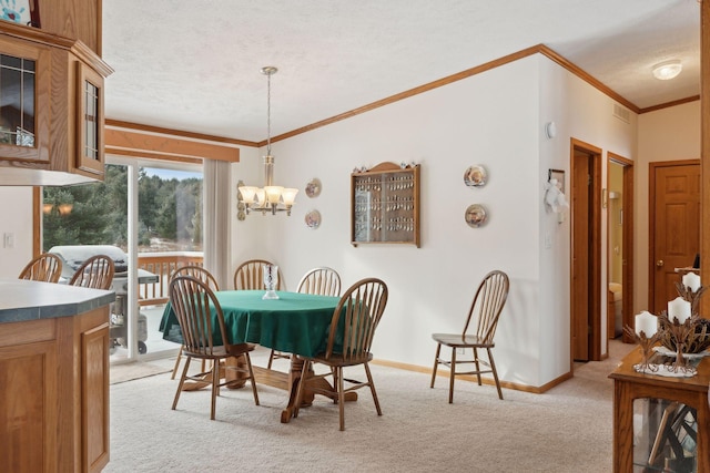 dining area featuring crown molding, light carpet, a textured ceiling, and an inviting chandelier