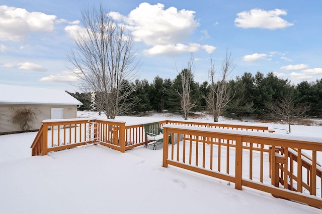 view of snow covered deck