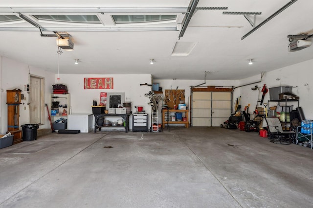 garage featuring a garage door opener