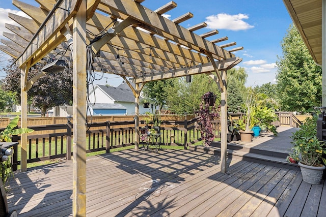 wooden terrace with a pergola