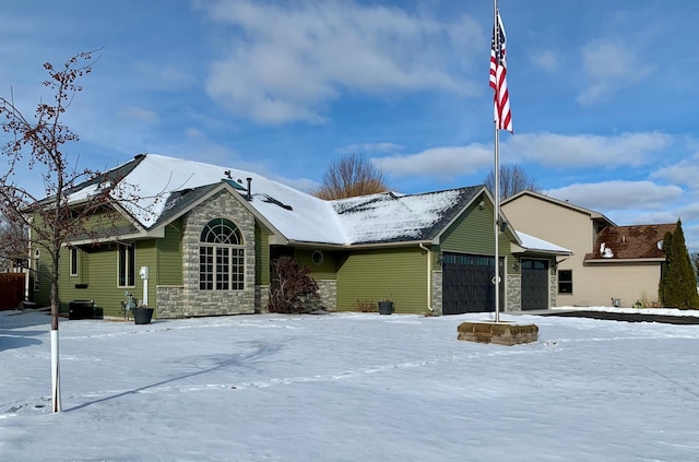 view of front of property with a garage