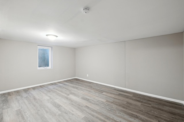 empty room featuring hardwood / wood-style flooring