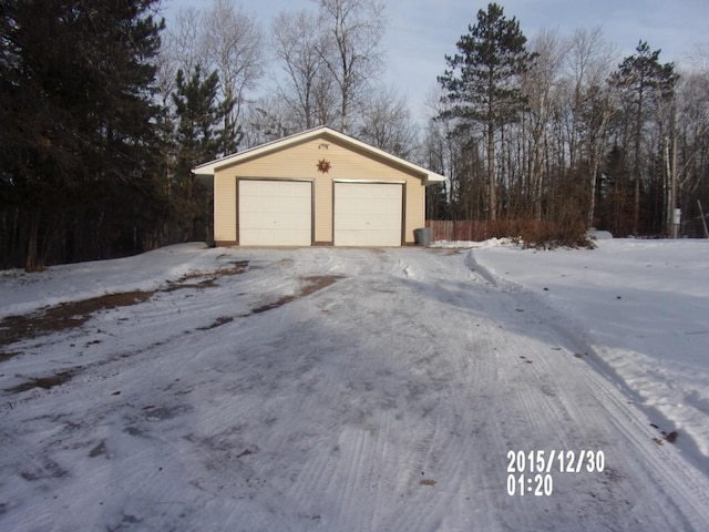 view of snow covered garage