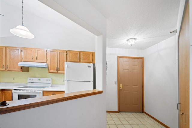 kitchen with a textured ceiling, light tile patterned floors, decorative light fixtures, and white appliances