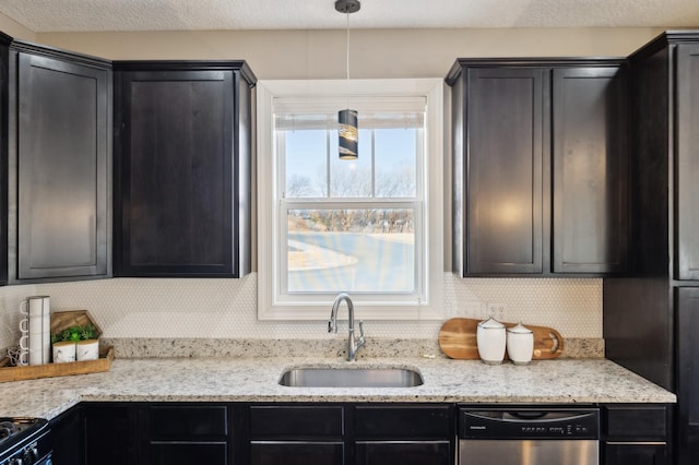 kitchen with decorative backsplash, dishwasher, decorative light fixtures, light stone countertops, and a sink