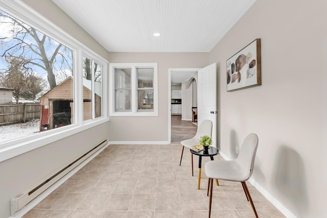 sitting room with a baseboard radiator