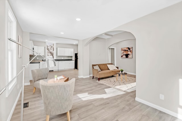 living area featuring light hardwood / wood-style flooring