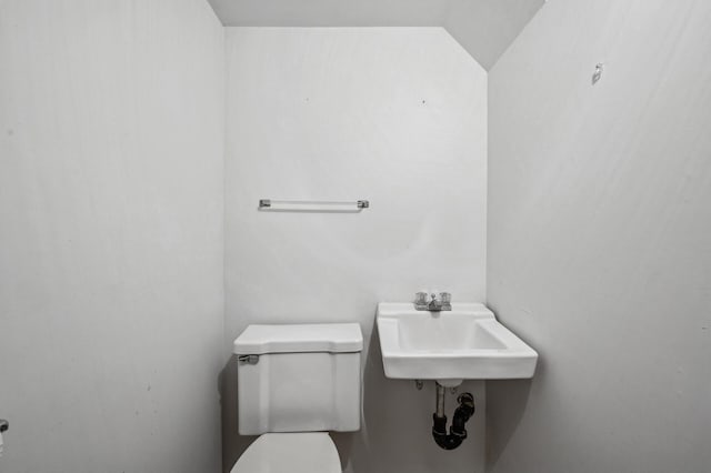 bathroom with toilet and sink