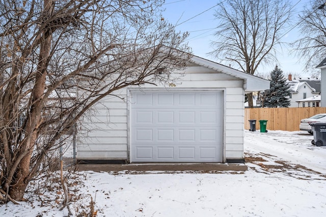 view of snow covered garage