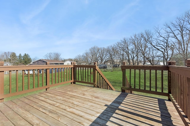 deck featuring a lawn