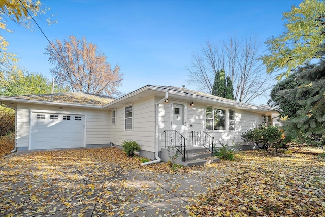 single story home with a garage