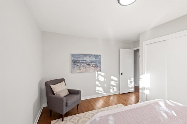 bedroom featuring a closet and hardwood / wood-style flooring