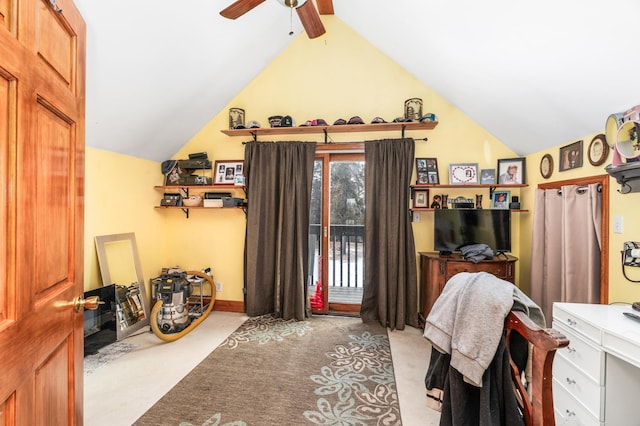 carpeted bedroom featuring access to exterior, ceiling fan, and lofted ceiling