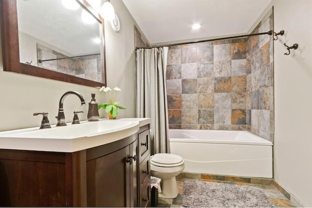 full bathroom featuring vanity, toilet, and shower / bath combo with shower curtain