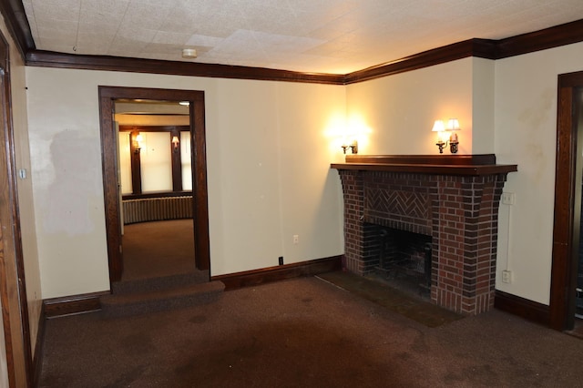 unfurnished living room with crown molding, dark colored carpet, and a brick fireplace