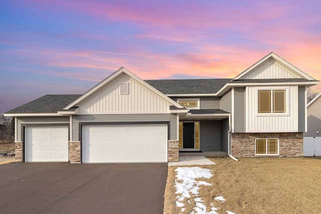 view of front of property featuring a garage