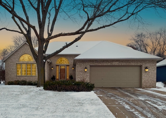 view of front of property featuring a garage