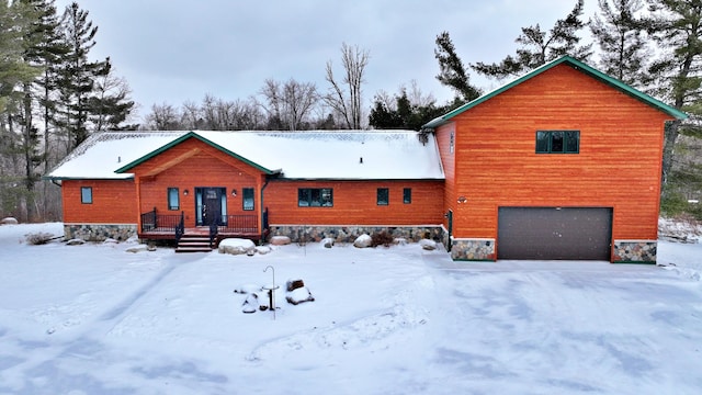 view of front of home with a garage