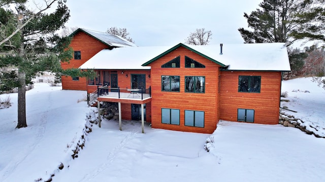 view of snow covered property