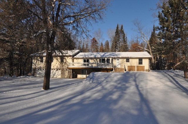 view of front of property featuring a wooden deck