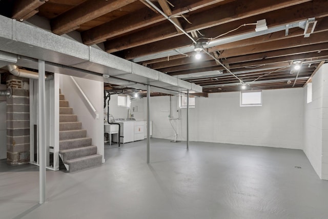 basement with separate washer and dryer