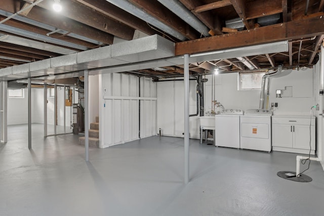 basement featuring washer and clothes dryer