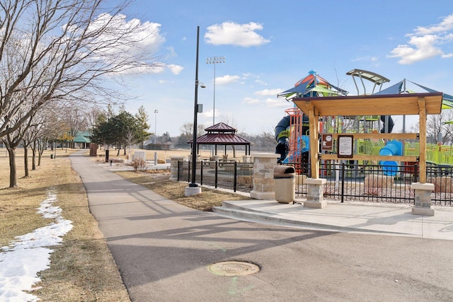 view of property's community with a playground and a gazebo