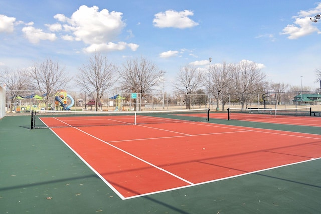 view of tennis court featuring basketball court