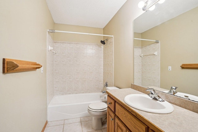 full bathroom with tile patterned flooring, vanity, a textured ceiling, toilet, and tiled shower / bath