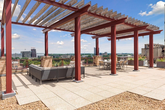 view of patio / terrace with an outdoor living space and a pergola