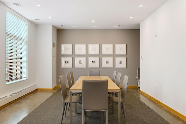 dining space with a baseboard heating unit, visible vents, plenty of natural light, and recessed lighting