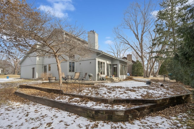 view of snow covered property