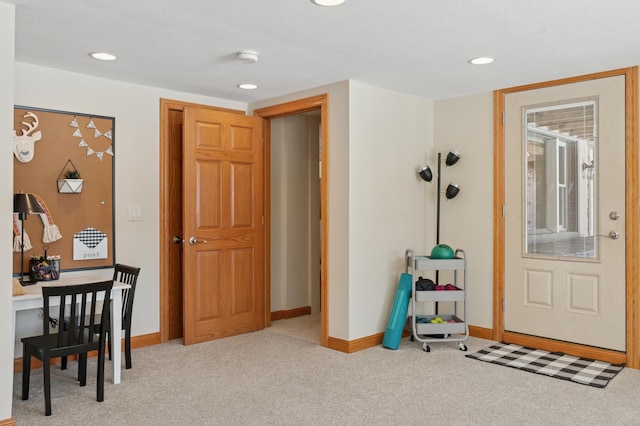 interior space with recessed lighting, baseboards, and carpet flooring