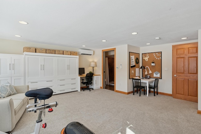 exercise room featuring recessed lighting, an AC wall unit, baseboards, and carpet floors