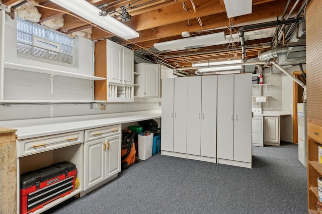 unfinished basement with washer / dryer