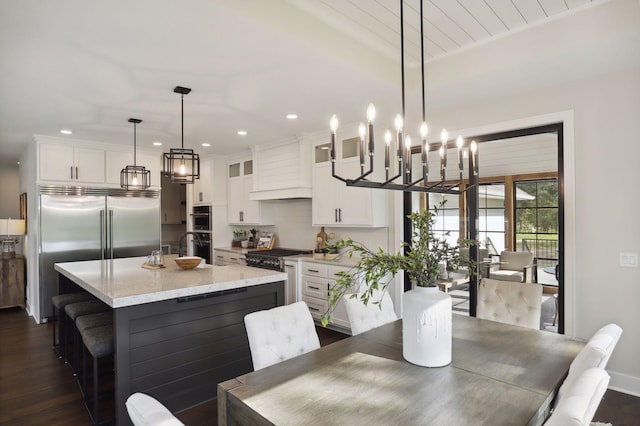 dining area with dark wood-type flooring