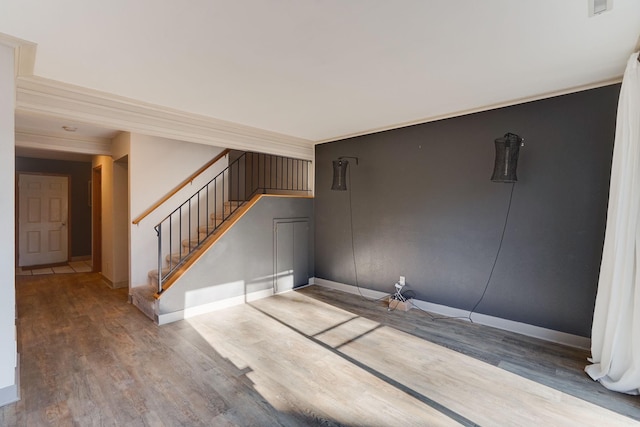 empty room with hardwood / wood-style flooring